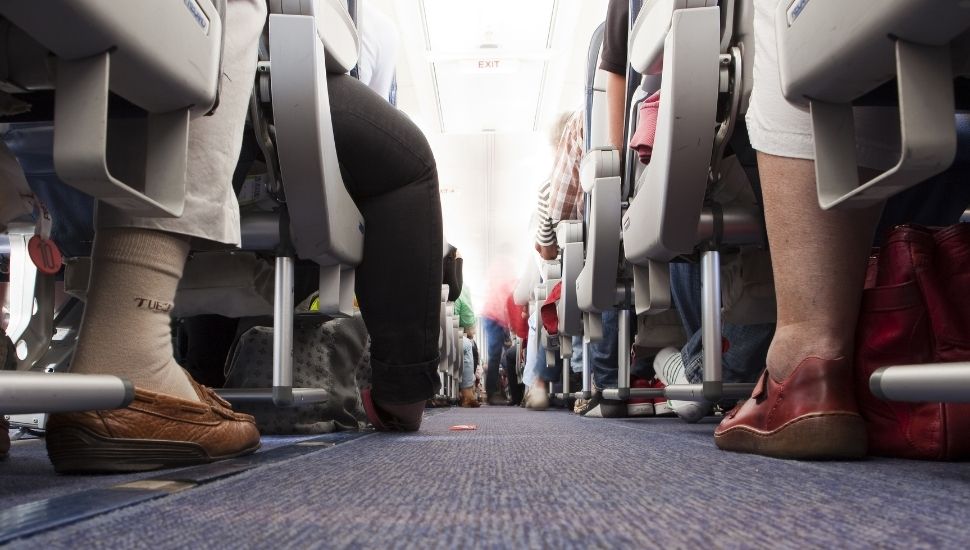 Image taken at floor level of passengers on plane