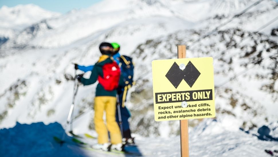 Black run skiing