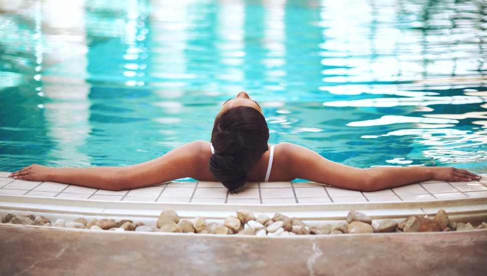 Woman relaxing in pool