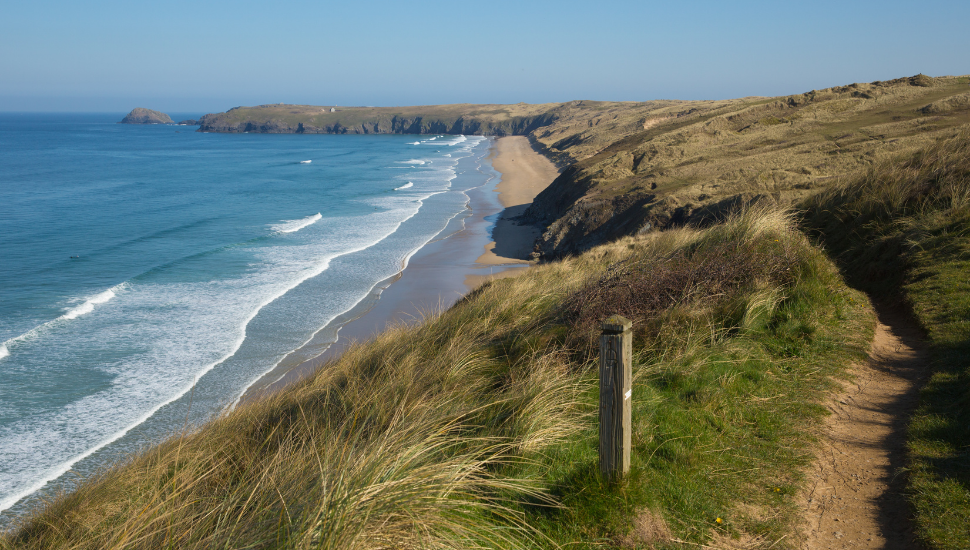 South west coast path view to Perran sands beach near Perranporth North Cornwall